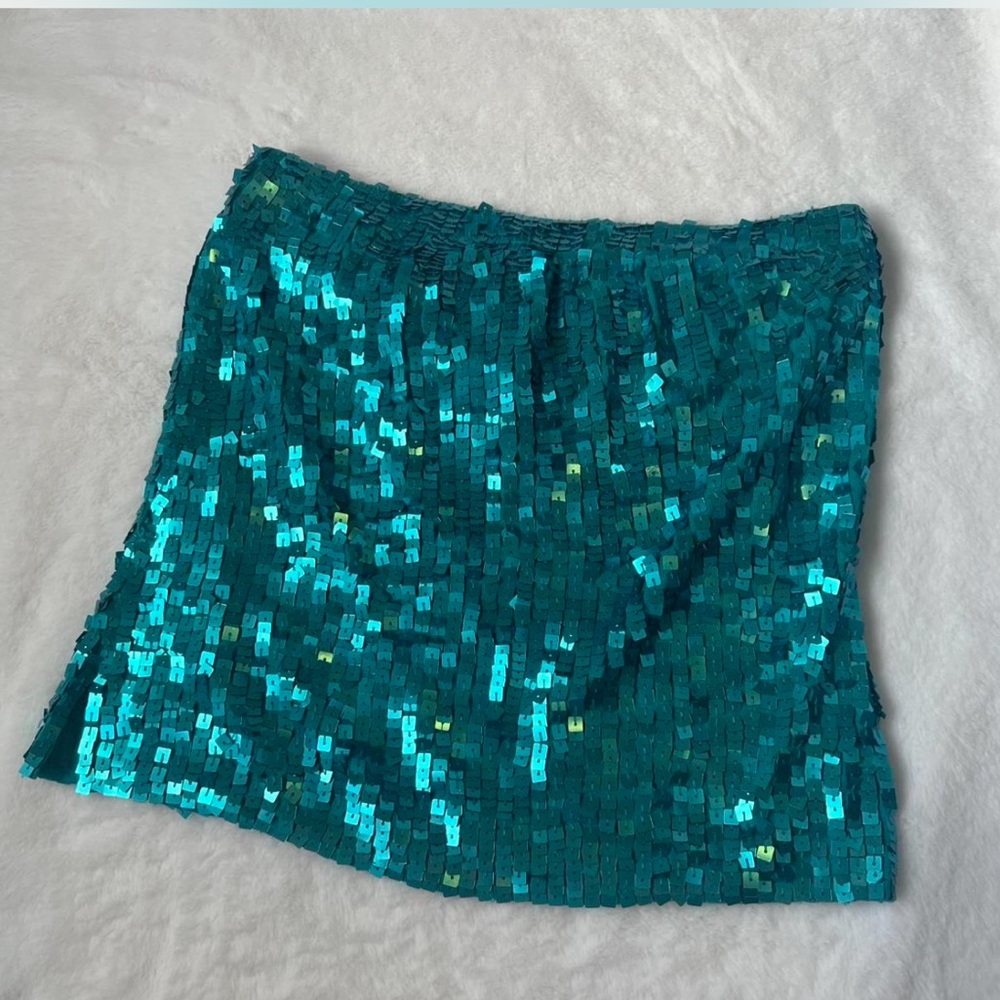 Sequin teal tube top - size large 
78% silk